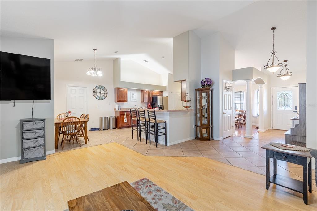 4530 Treasure Cay Road Tavares, FL 32778 - Photo 29 of 60 a view of a livingroom with furniture and a flat screen tv