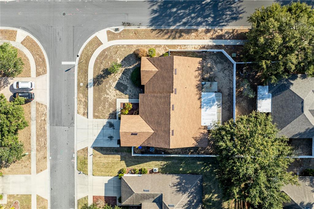 4530 Treasure Cay Road Tavares, FL 32778 - Photo 5 of 60 an aerial view of residential house with outdoor space and swimming pool