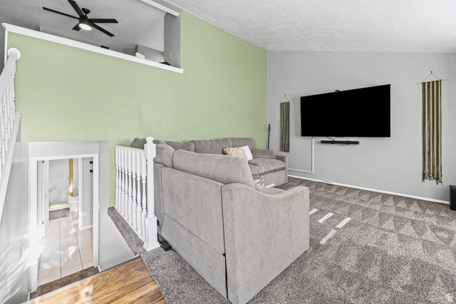 5896 South 3950th Street West Roy, UT 84067 - Photo 5 of 29 Living room with a ceiling fan and baseboards