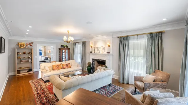 a living room with furniture and a rug