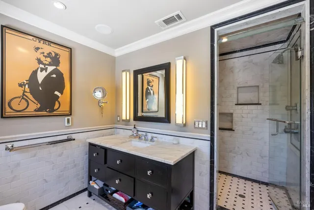 a front view of a house with yard and sitting area