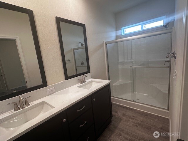 2101 South 324th Street, Unit 188 Federal Way, WA 98003 - Photo 8 of 10 a bathroom with a granite countertop sink mirror and double