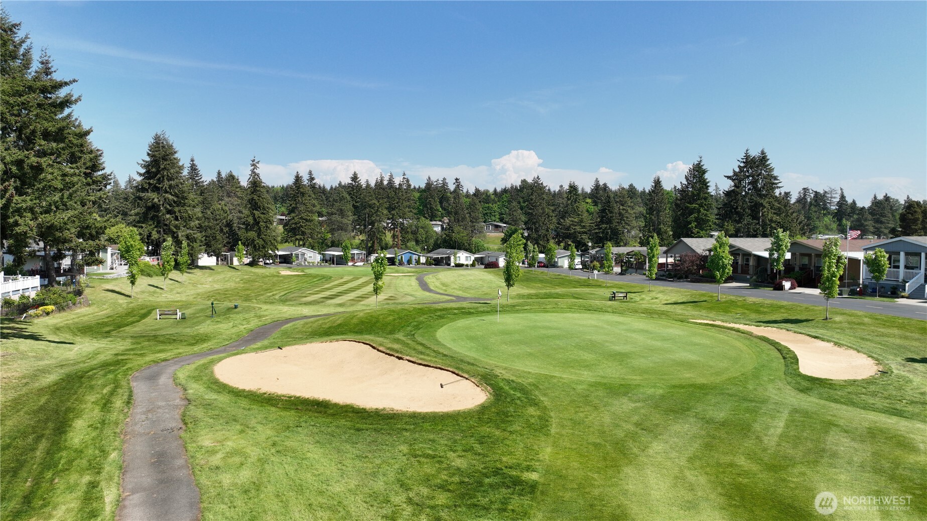 2101 South 324th Street, Unit 188 Federal Way, WA 98003 - Photo 10 of 10 a view of a golf course with a play ground