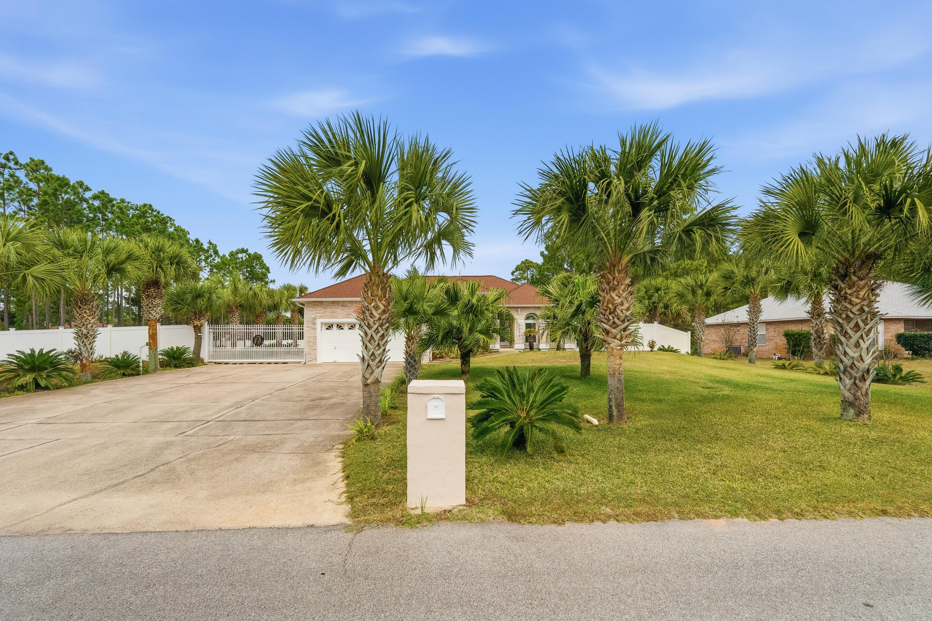 7456 Woodmont Road Navarre, FL 32566 - Photo 87 of 105 Drive to gated parking
