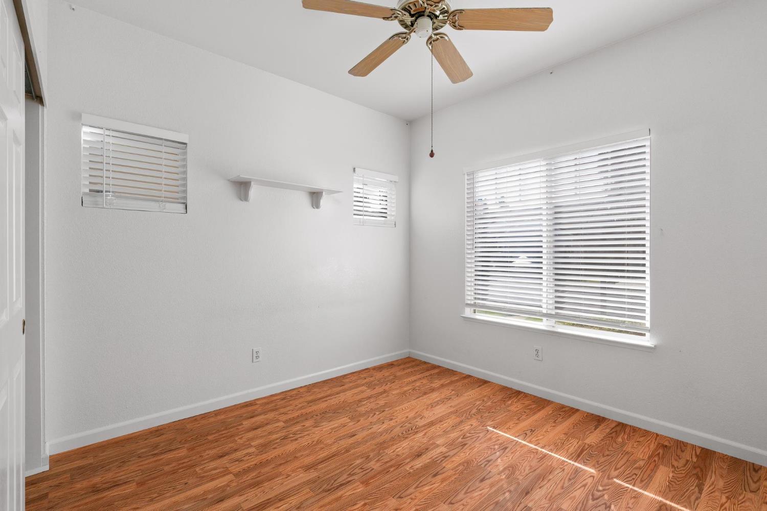 1833 Rail Street Manteca, CA 95337 - Photo 25 of 40 a view of an empty room with a window