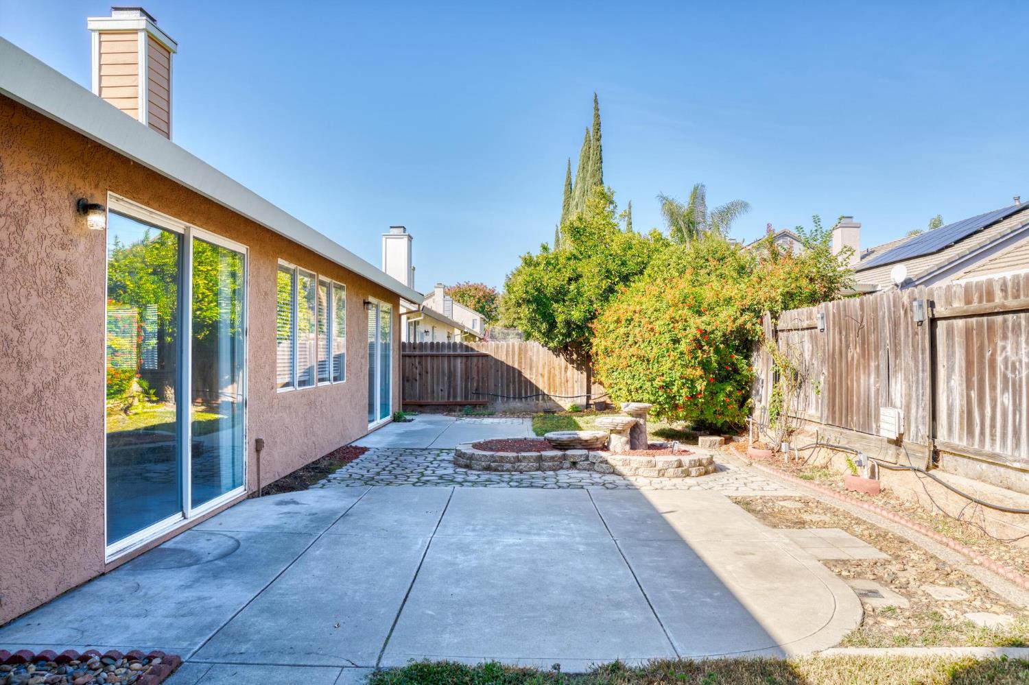 1833 Rail Street Manteca, CA 95337 - Photo 29 of 40 a view of a house with backyard and garden