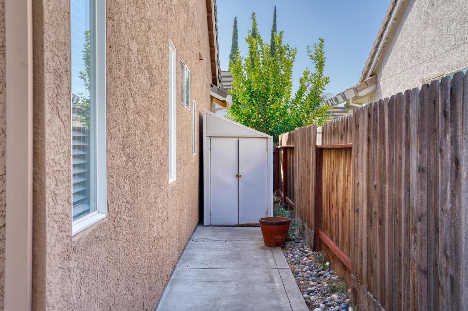 1833 Rail Street Manteca, CA 95337 - Photo 35 of 40 a house view with a garden space