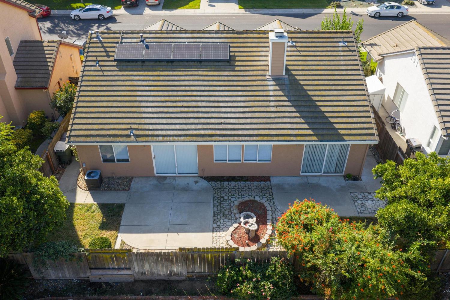 1833 Rail Street Manteca, CA 95337 - Photo 36 of 40 a view of a house with a yard and a garage