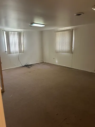 an empty room with a window