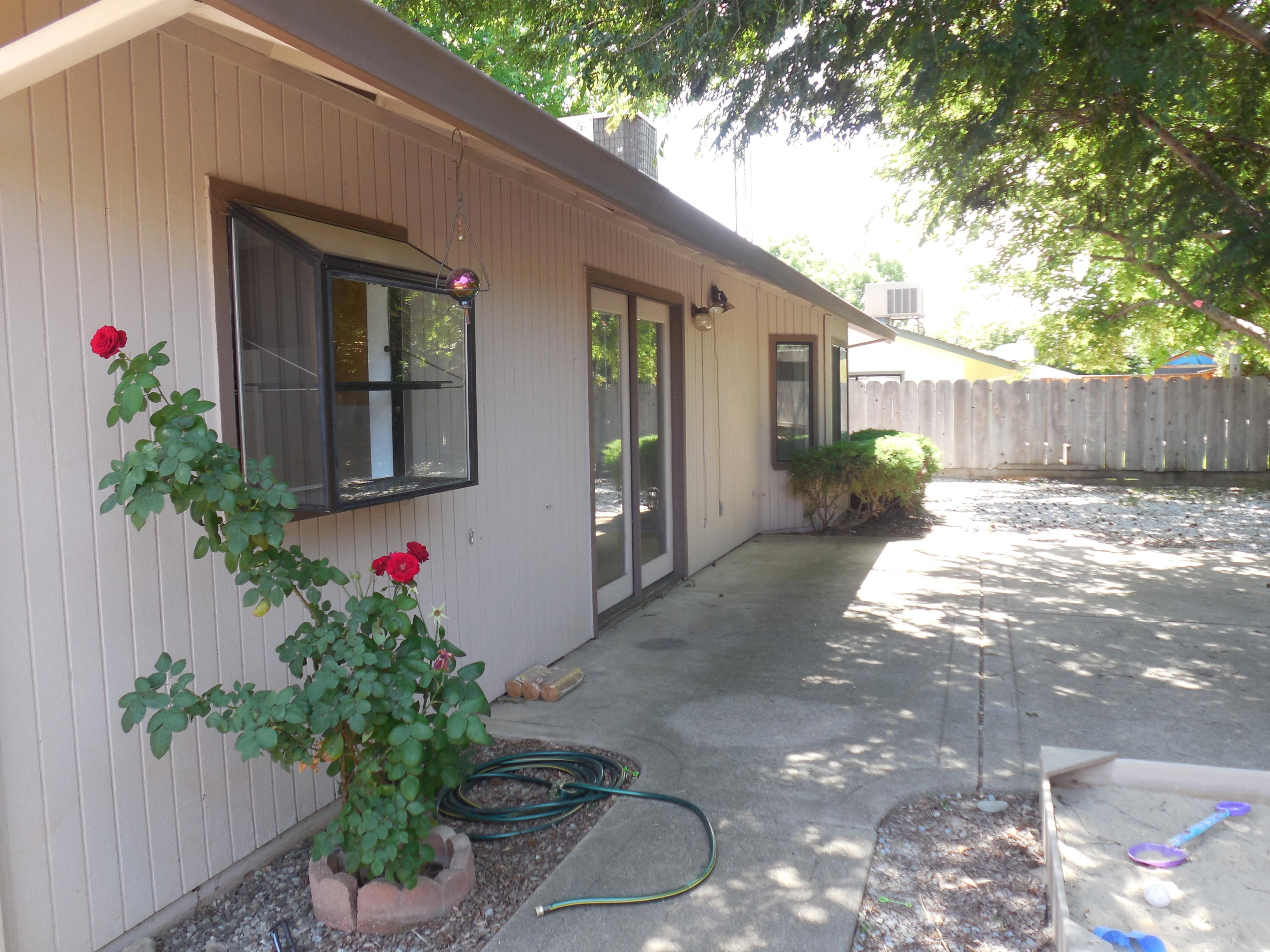 3654 Santa Rosa Way Redding, CA 96003 - Photo 15 of 16 a flower plants in front of a house