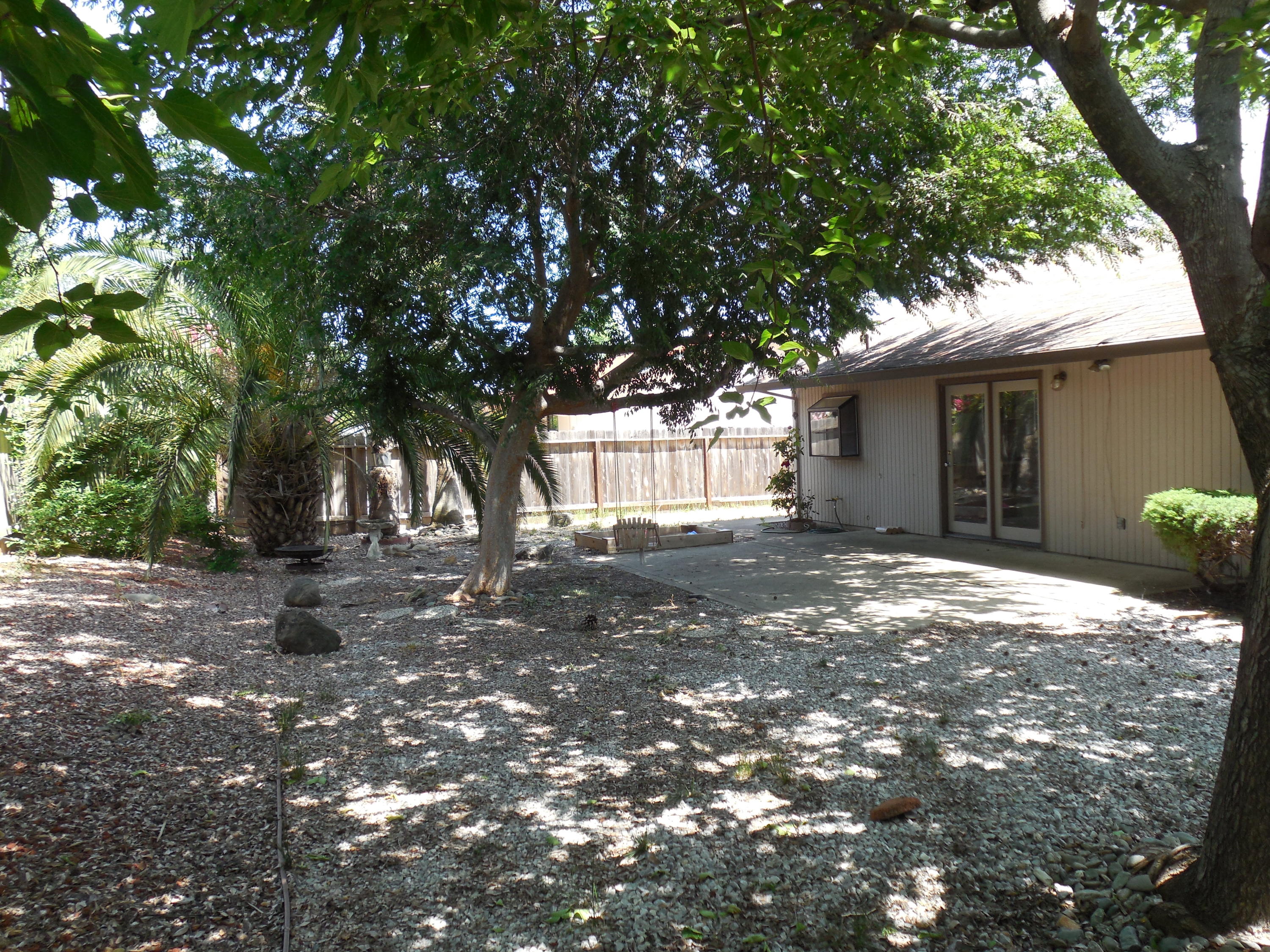 3654 Santa Rosa Way Redding, CA 96003 - Photo 16 of 16 a view of a house with a tree