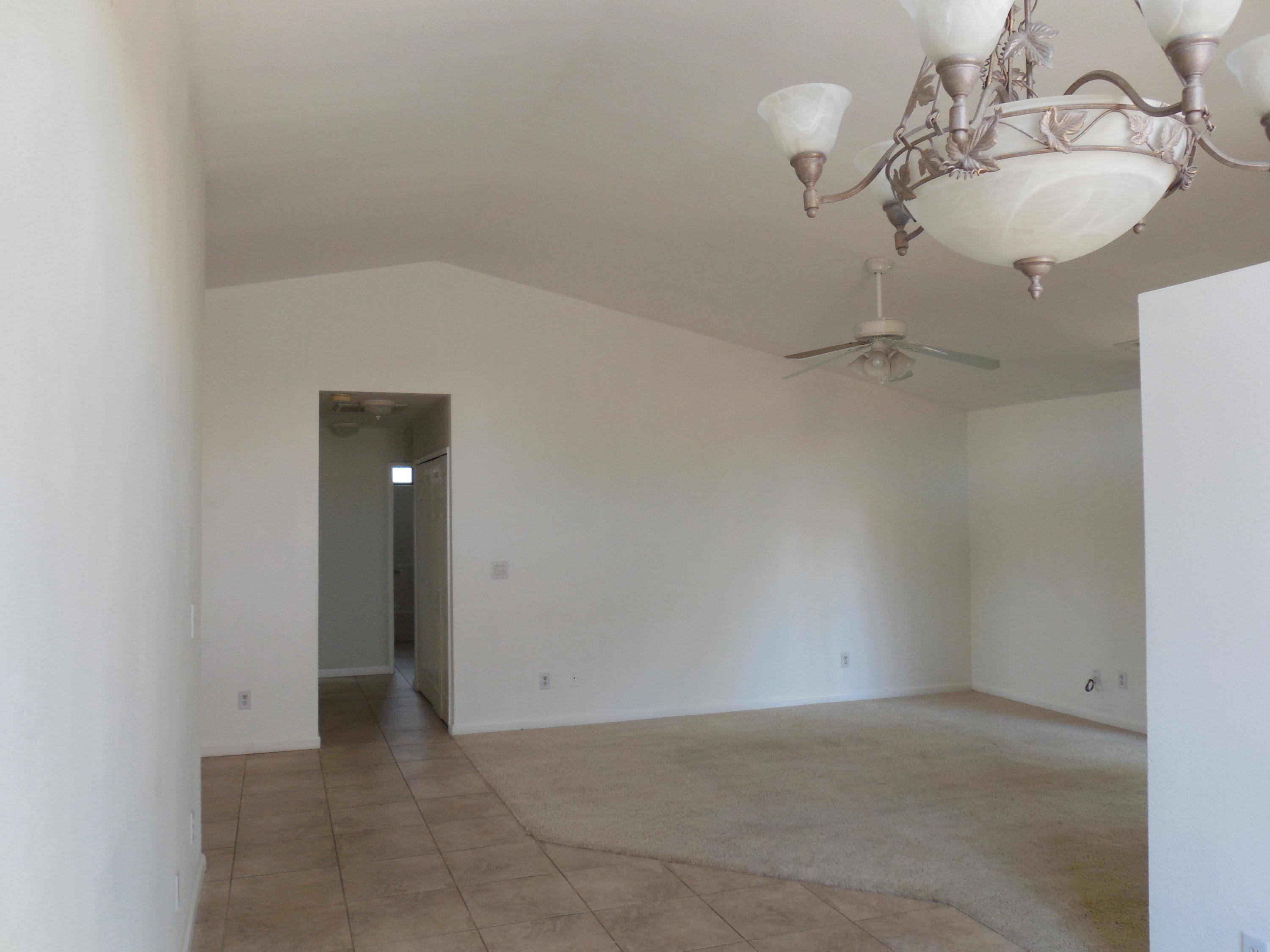 3654 Santa Rosa Way Redding, CA 96003 - Photo 6 of 16 a view of a room with a mirror and dresser