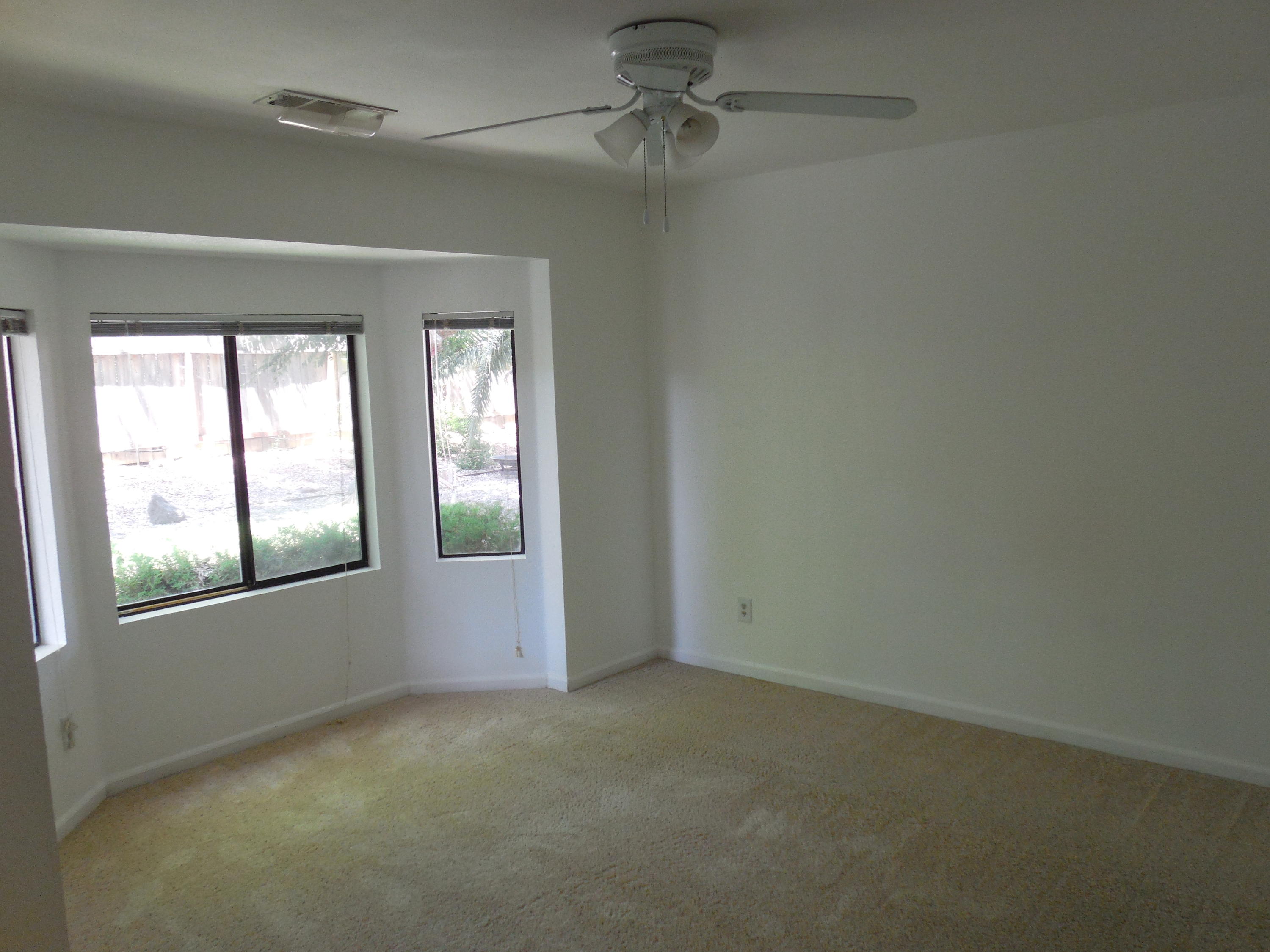 3654 Santa Rosa Way Redding, CA 96003 - Photo 10 of 16 an empty room that has a window
