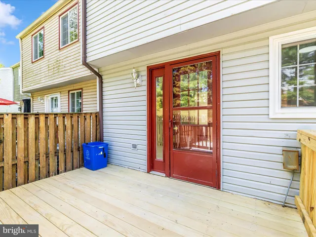 a view of a wooden roof deck