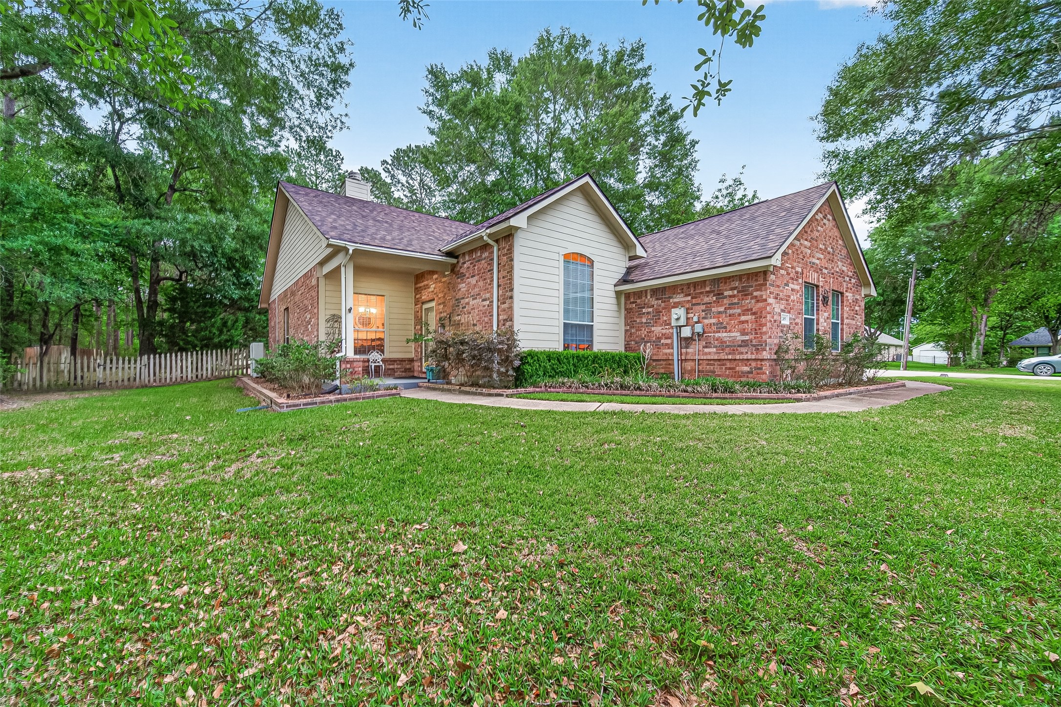 12455 West Summerlin Conroe, TX 77302 - Photo 1 of 31 a front view of house with yard and green space