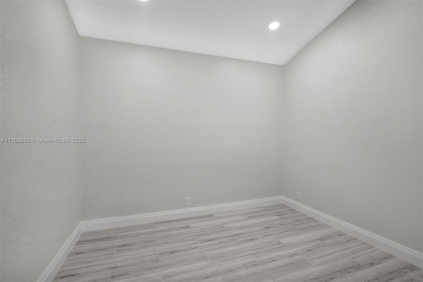 6688 Northwest 25th Court Boca Raton, FL 33496 - Photo 33 of 64 a view of an empty room