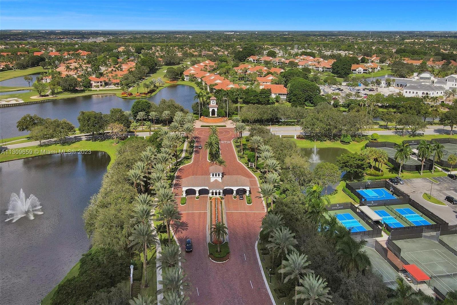 6688 Northwest 25th Court Boca Raton, FL 33496 - Photo 47 of 64 an aerial view of residential houses with outdoor space and ocean view