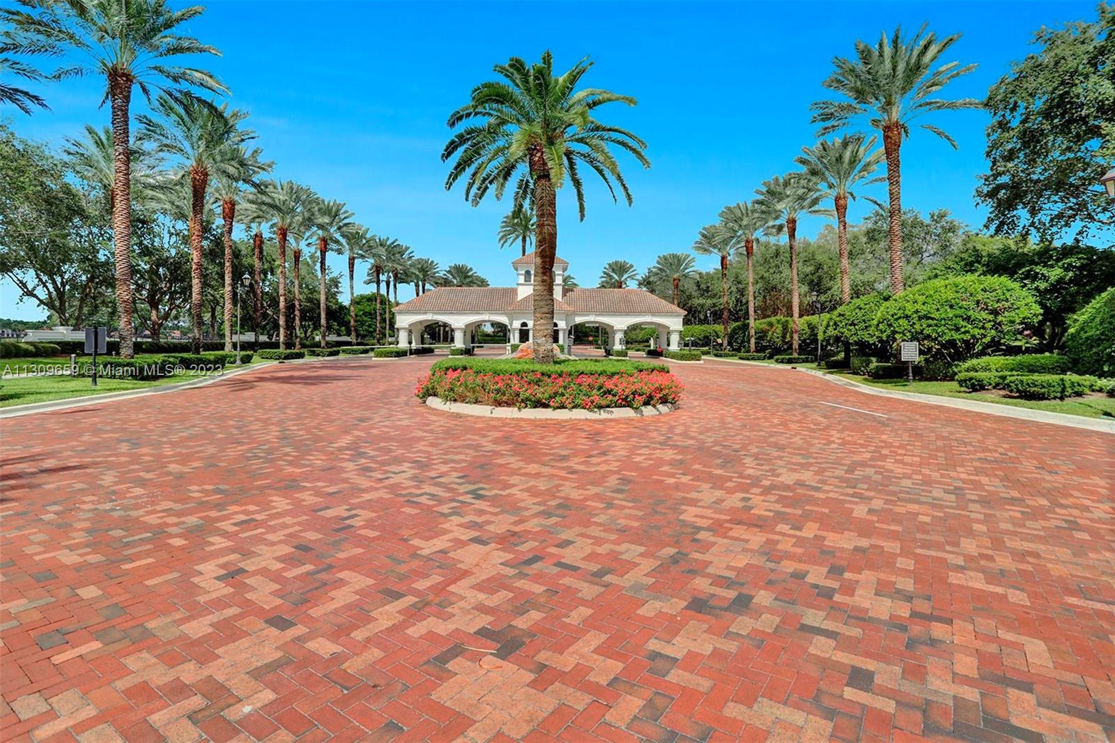 6688 Northwest 25th Court Boca Raton, FL 33496 - Photo 49 of 64 a view of a backyard with palm trees