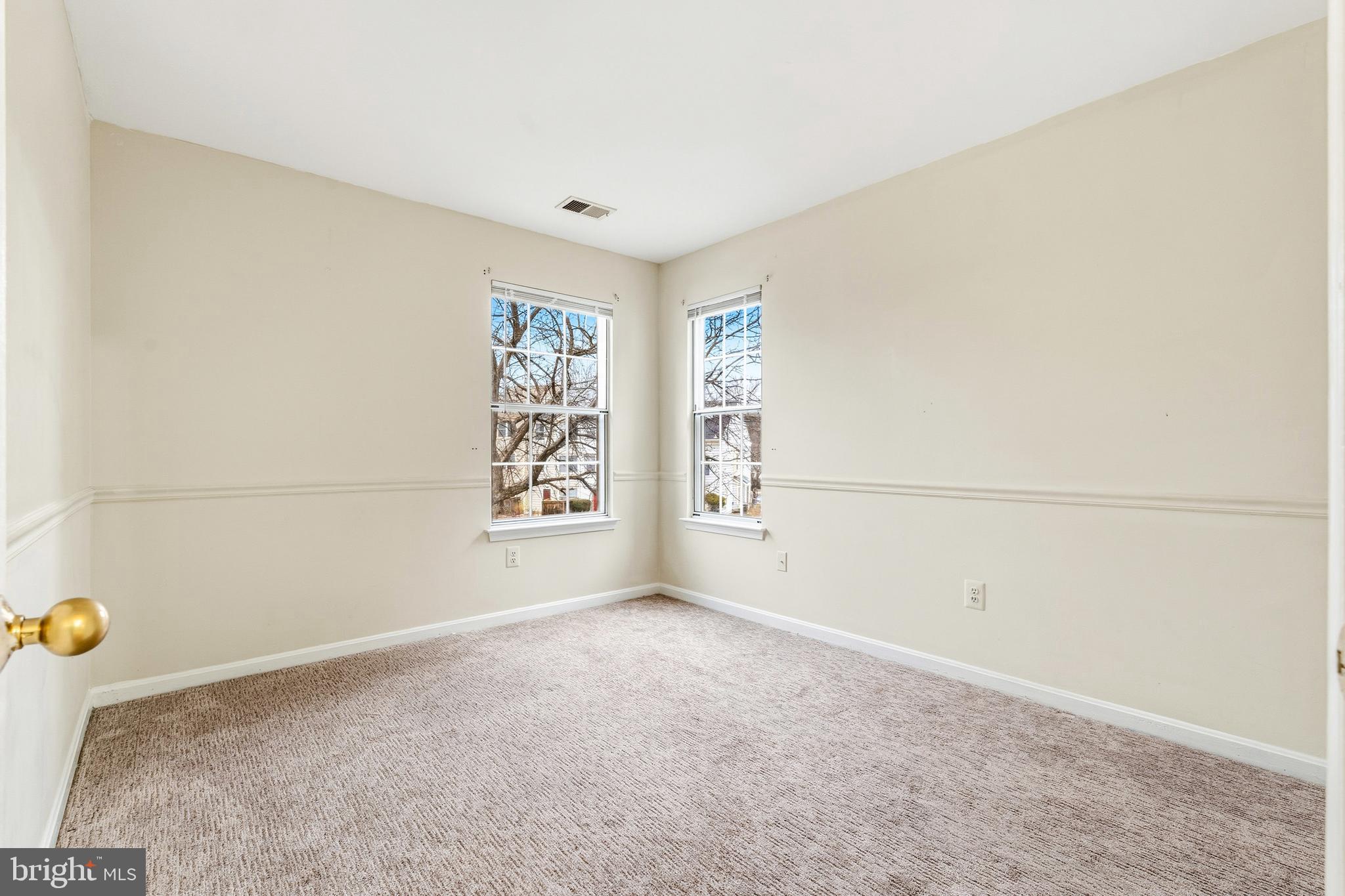 2 Highstream Court, Unit 684 Germantown, MD 20874 - Photo 20 of 25 an empty room with windows