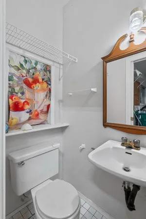 a view of a city with lush green forest