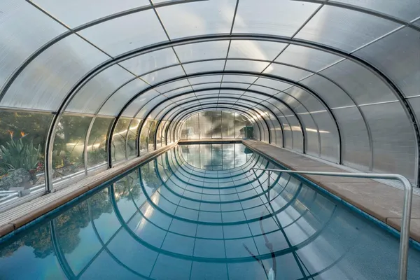 a view of a balcony with wooden floor