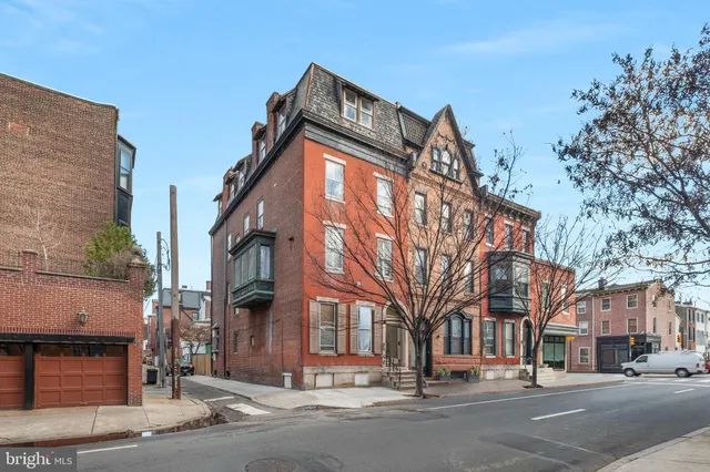 a view of a building and a street