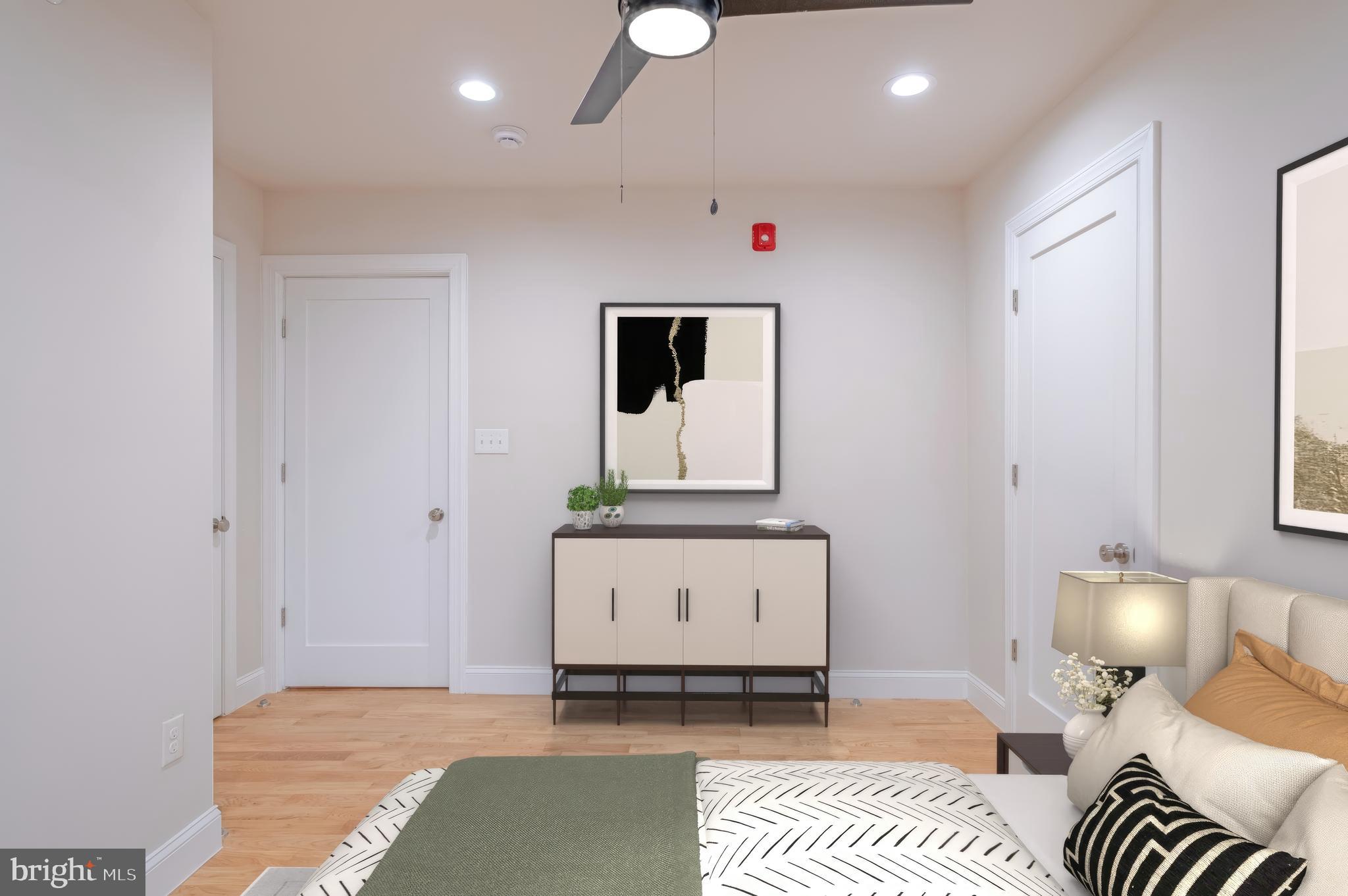 333 South 21st Street, Unit 4 Philadelphia, PA 19103 - Photo 8 of 15 a living room with furniture and a couch