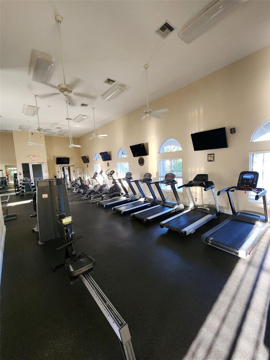 13986 Southwest 276th Street Homestead, FL 33032 - Photo 21 of 28 a view of a room with gym equipment