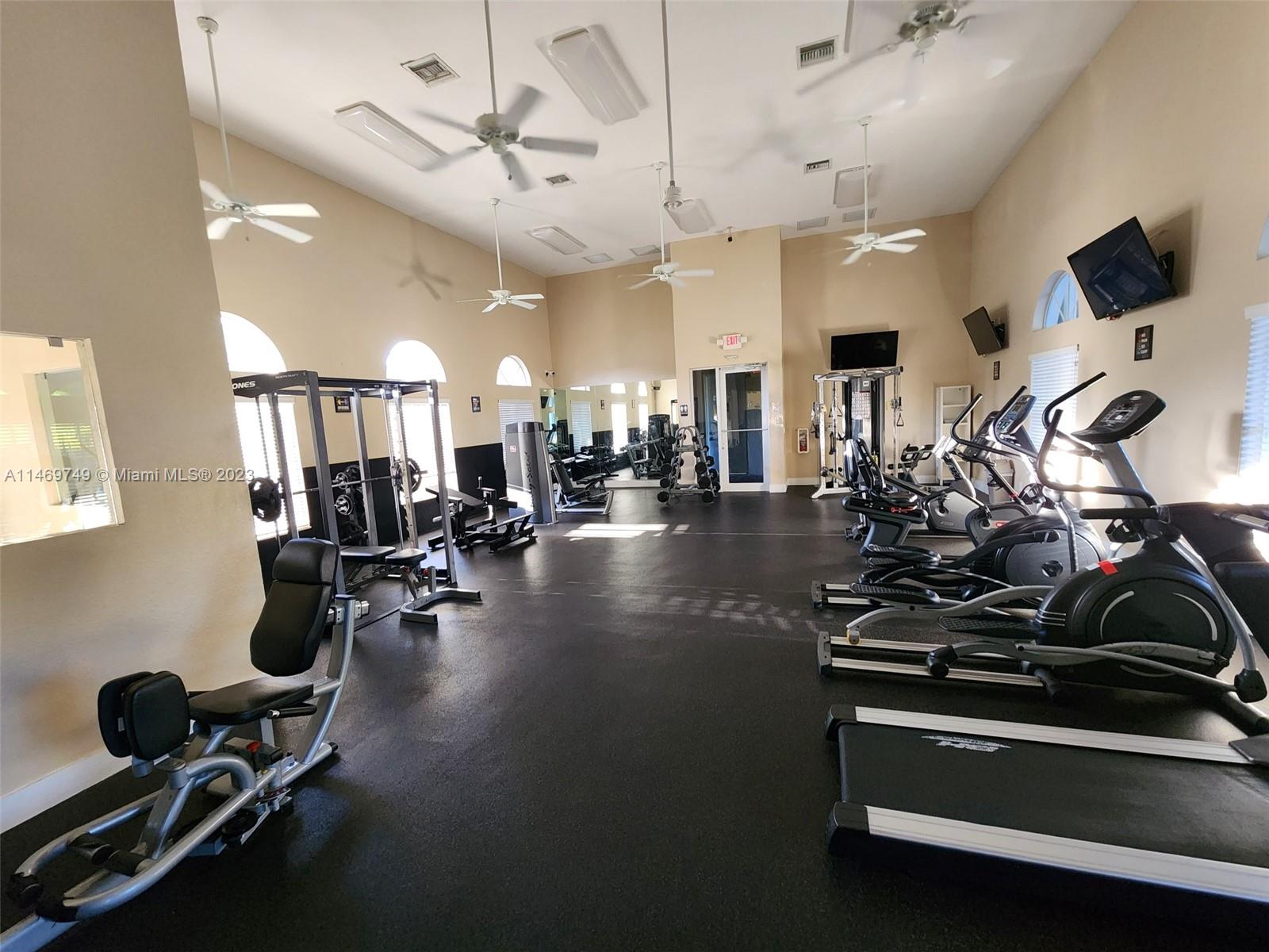 13986 Southwest 276th Street Homestead, FL 33032 - Photo 23 of 28 a view of a room with gym equipment