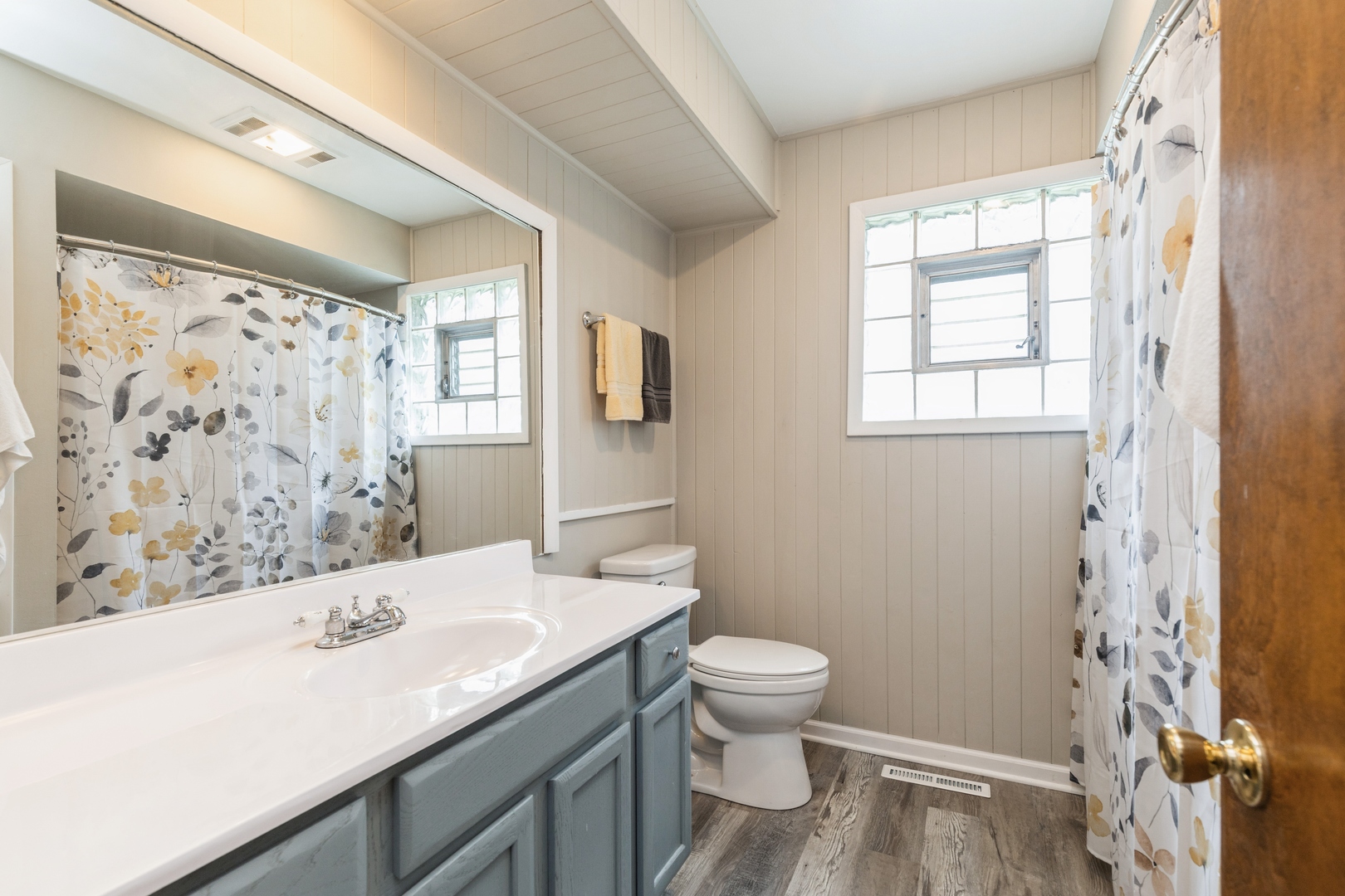 7701 Cedar Road Wonder Lake, IL 60097 - Photo 12 of 23 a bathroom with a sink toilet and shower