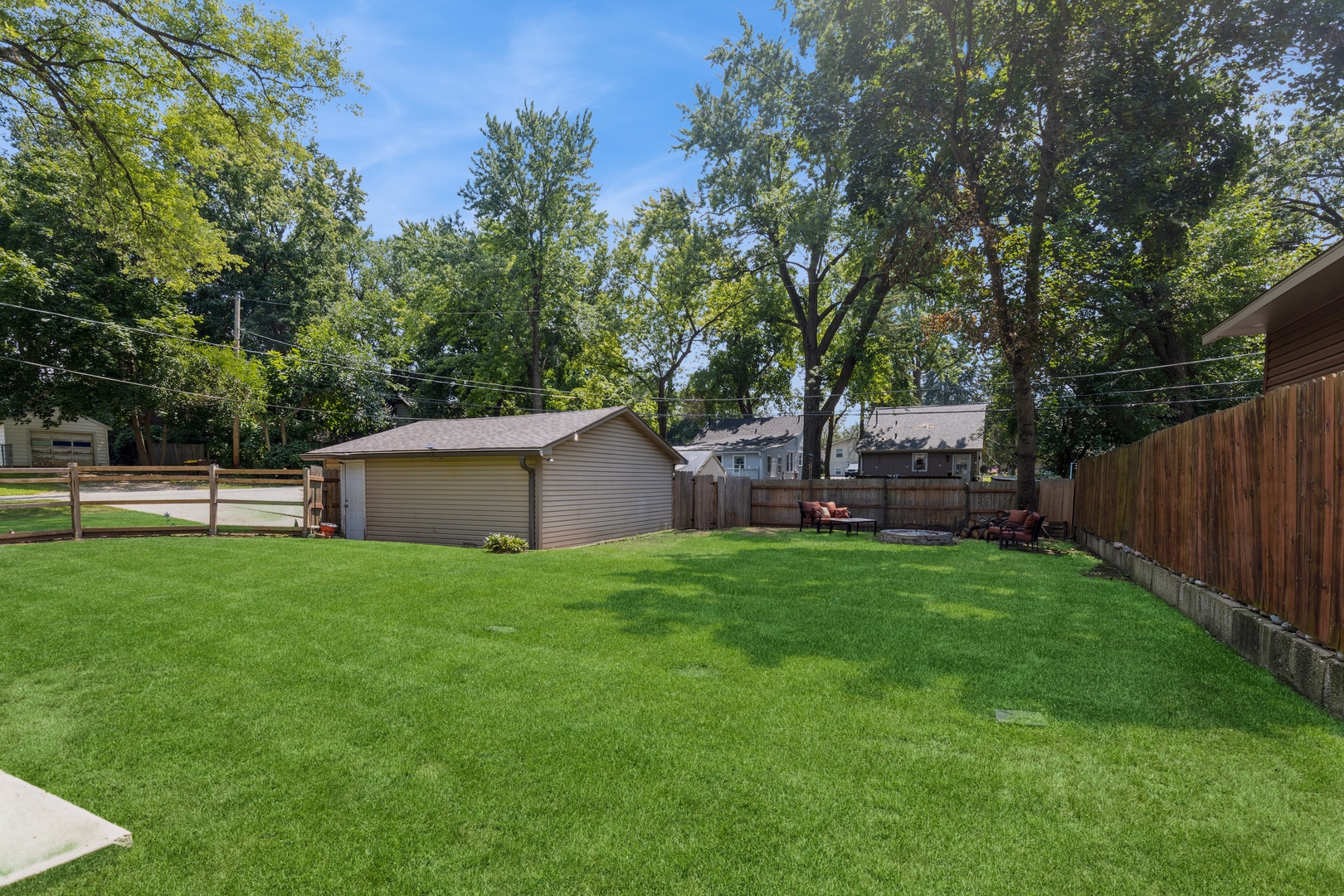 7701 Cedar Road Wonder Lake, IL 60097 - Photo 19 of 23 a view of a back yard
