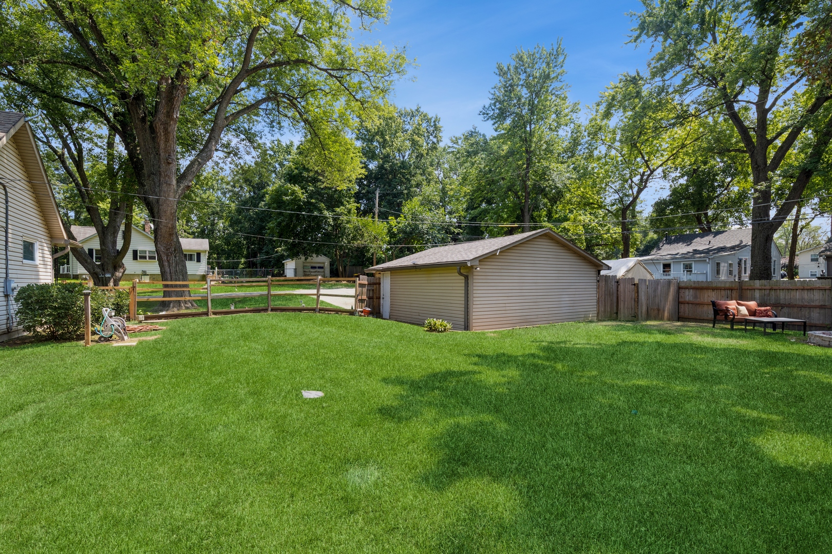 7701 Cedar Road Wonder Lake, IL 60097 - Photo 20 of 23 a view of a backyard with large trees