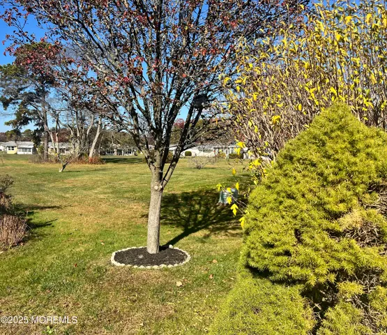 a sign that is sitting in the grass