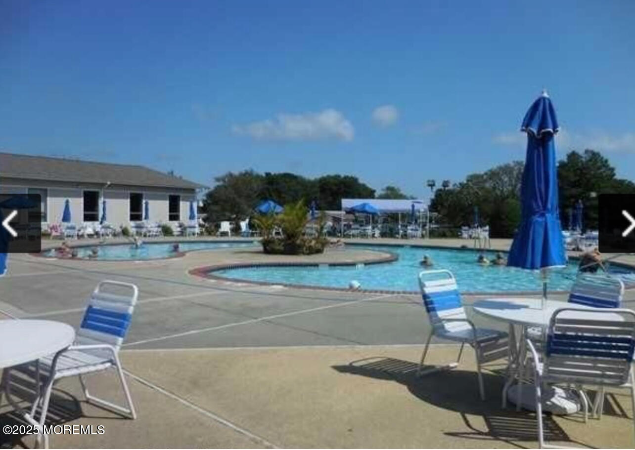 20 Lamb Road Brick, NJ 08724 - Photo 28 of 31 a view of a basket ball ground and a yard