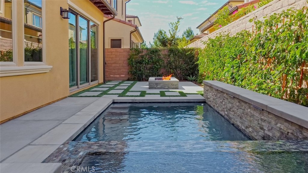 65 Rockinghorse Irvine, CA 92602 - Photo 2 of 51 a view of a yard with chairs
