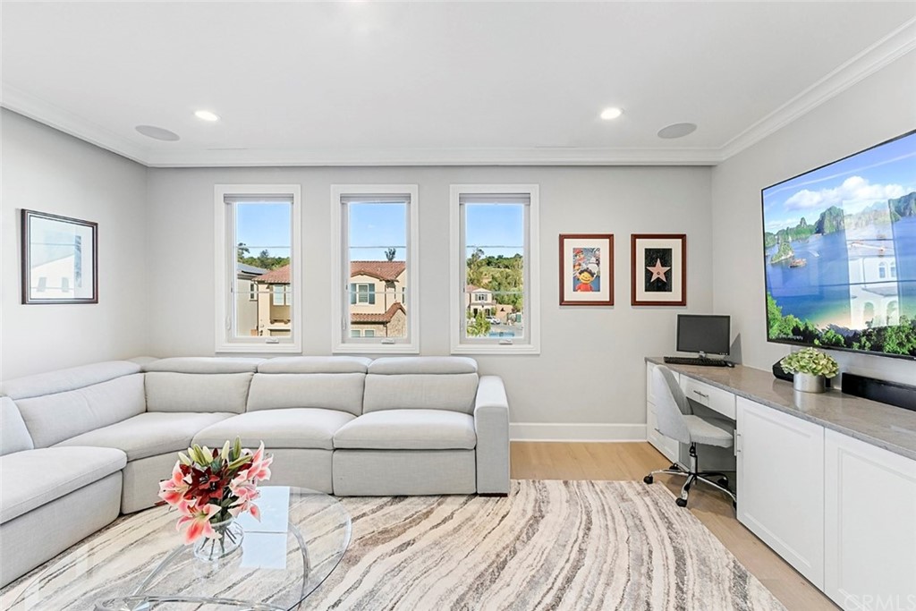 65 Rockinghorse Irvine, CA 92602 - Photo 20 of 51 a living room with furniture and a couch