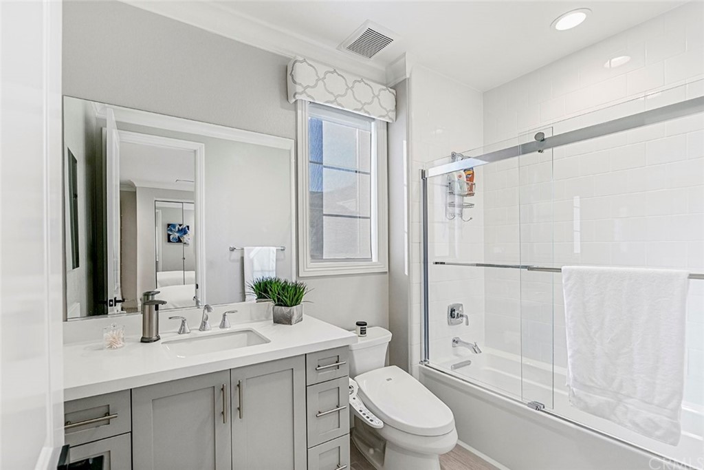 65 Rockinghorse Irvine, CA 92602 - Photo 32 of 51 a bathroom with a granite countertop sink toilet and shower