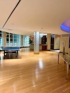 253 Northeast 2nd Street, Unit 224 Miami, FL 33132 - Photo 12 of 16 a swimming pool with outdoor seating and yard