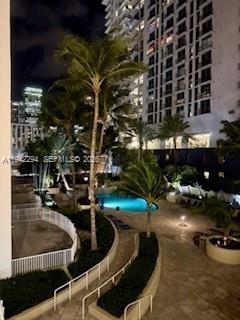 253 Northeast 2nd Street, Unit 224 Miami, FL 33132 - Photo 16 of 16 a picture of a couch in front of building