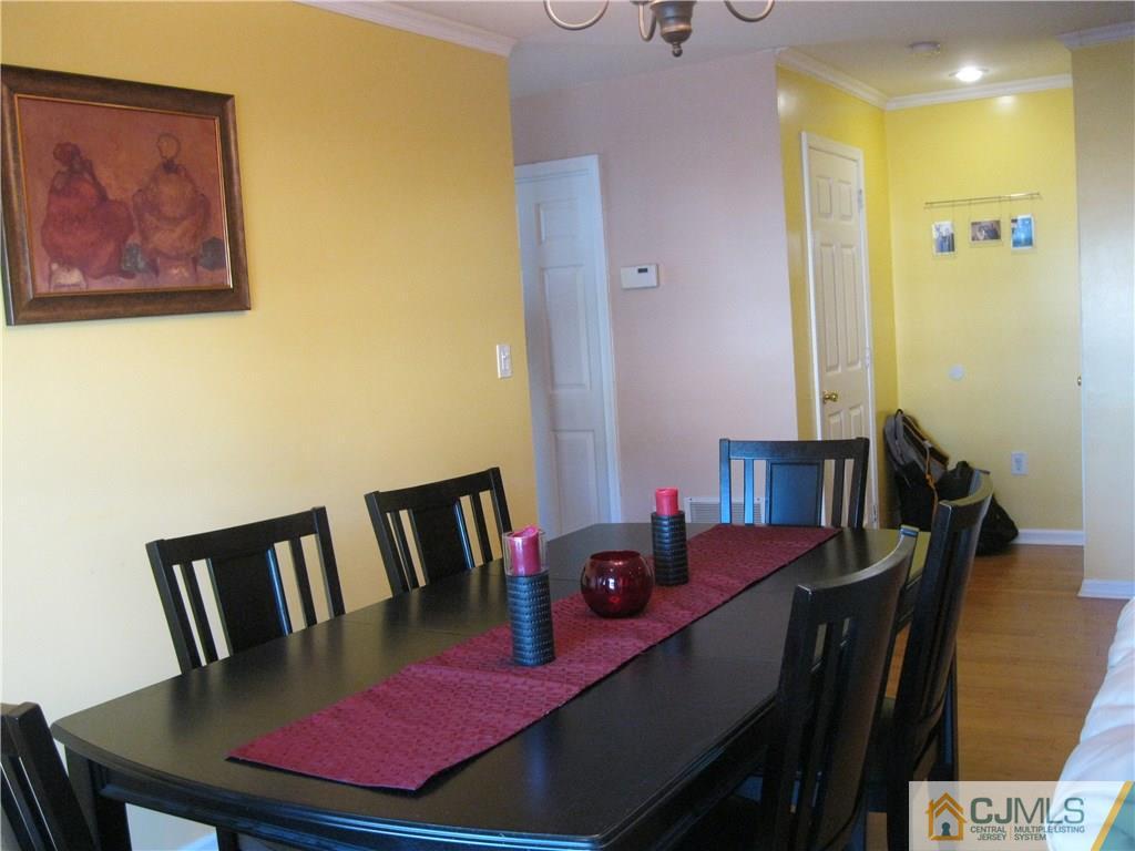2201 Timber Ridge Court Sayreville, NJ 08859 - Photo 7 of 17 a view of a dining room with furniture