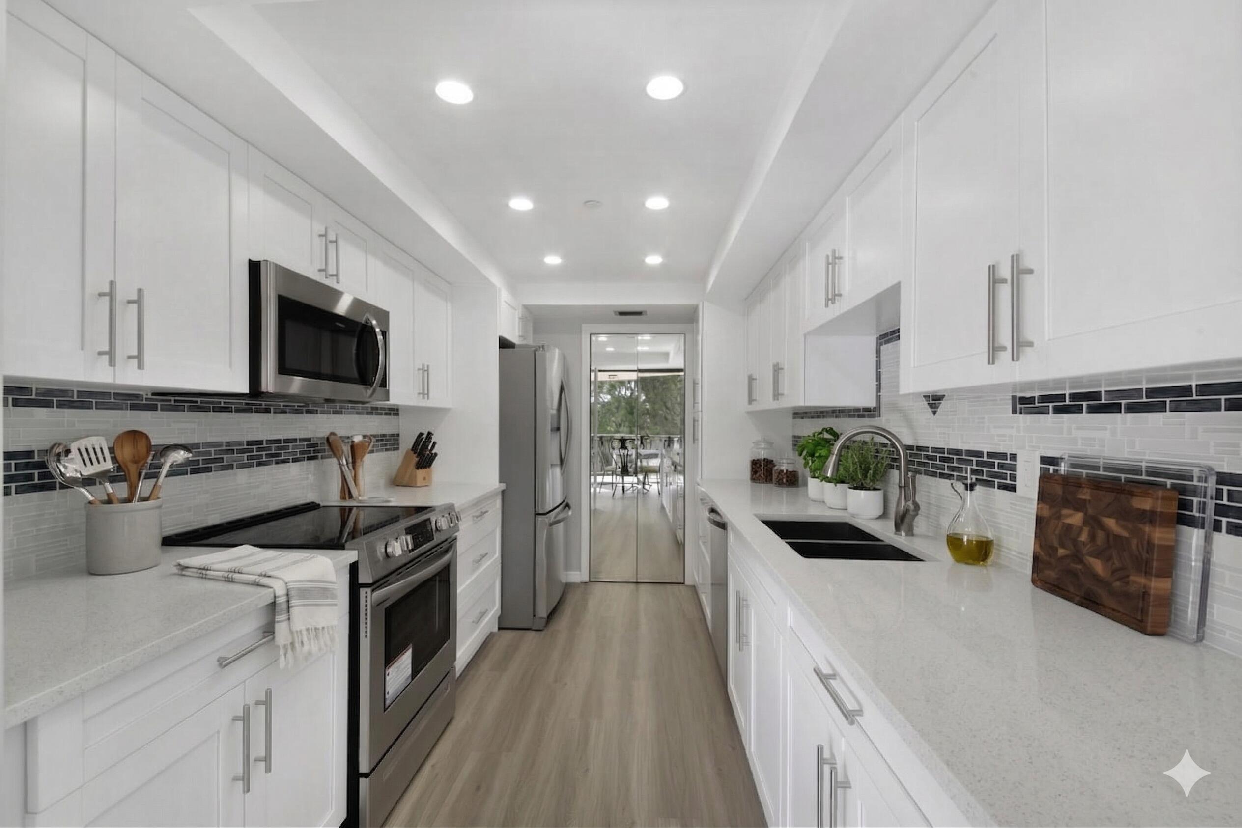 859 Jeffery Street, Unit 311 Boca Raton, FL 33487 - Photo 3 of 32 a kitchen with stove a sink and refrigerator
