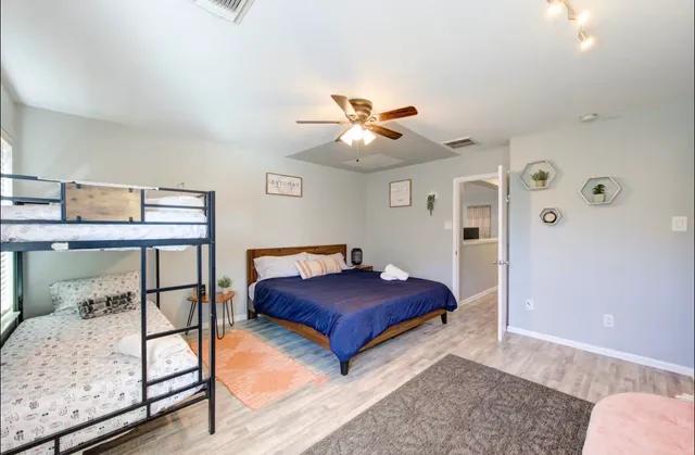 a bed room with a bed and a couch