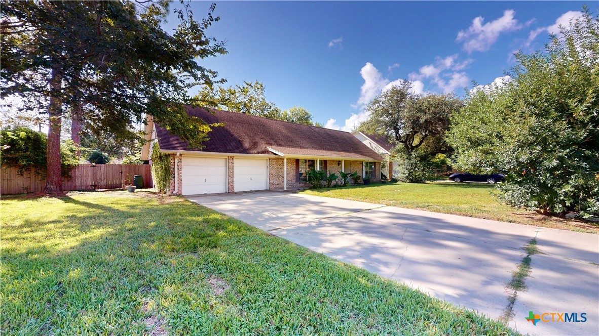 105 Tropical Drive Victoria, TX 77904 - Photo 1 of 45 a view of outdoor space yard and swimming pool