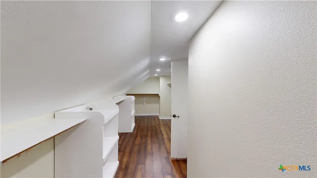 a view of entryway with wooden floor