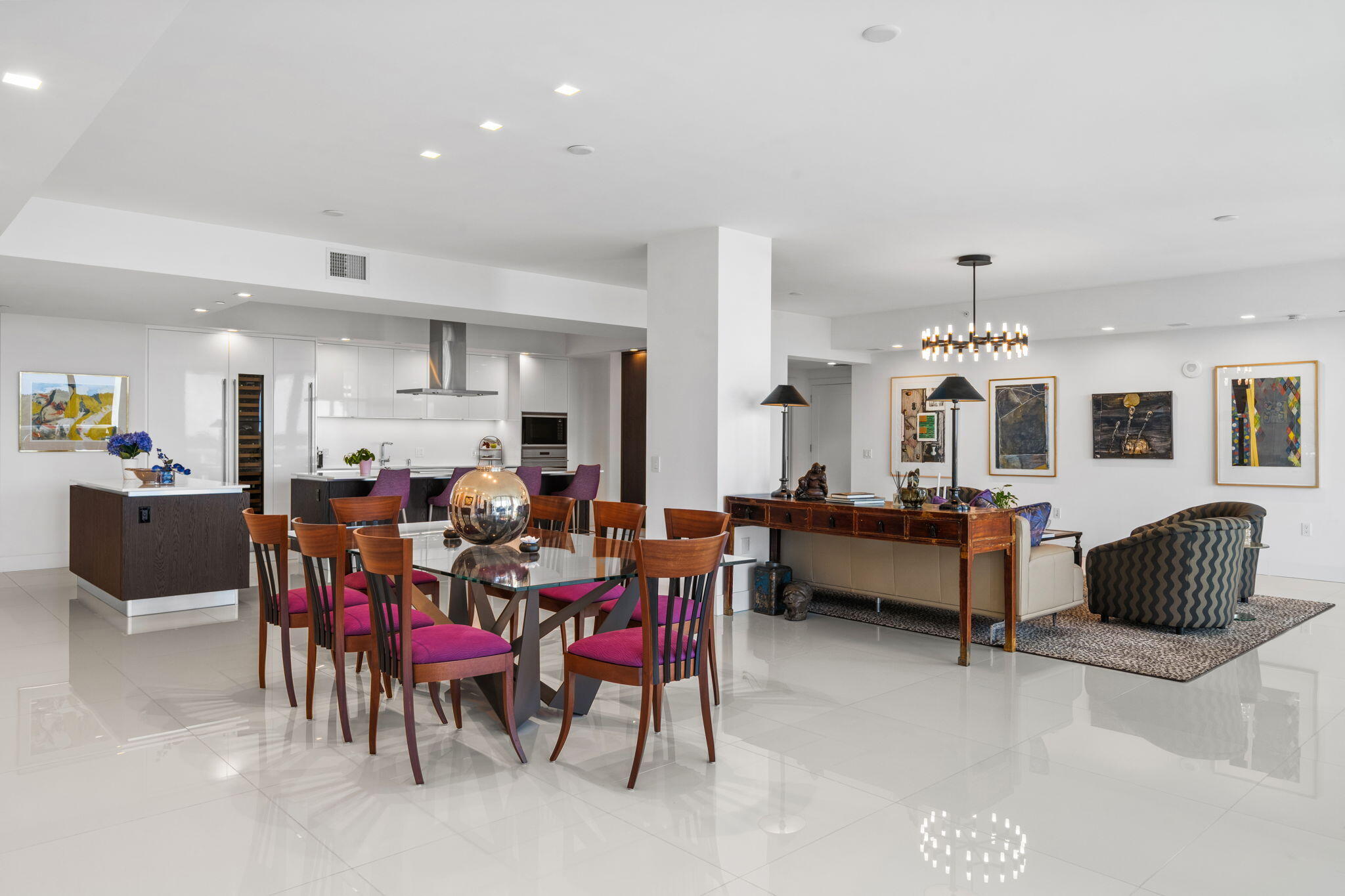 20155 Boca W Drive, Unit A404 Boca Raton, FL 33434 - Photo 3 of 52 a living room with furniture and a chandelier