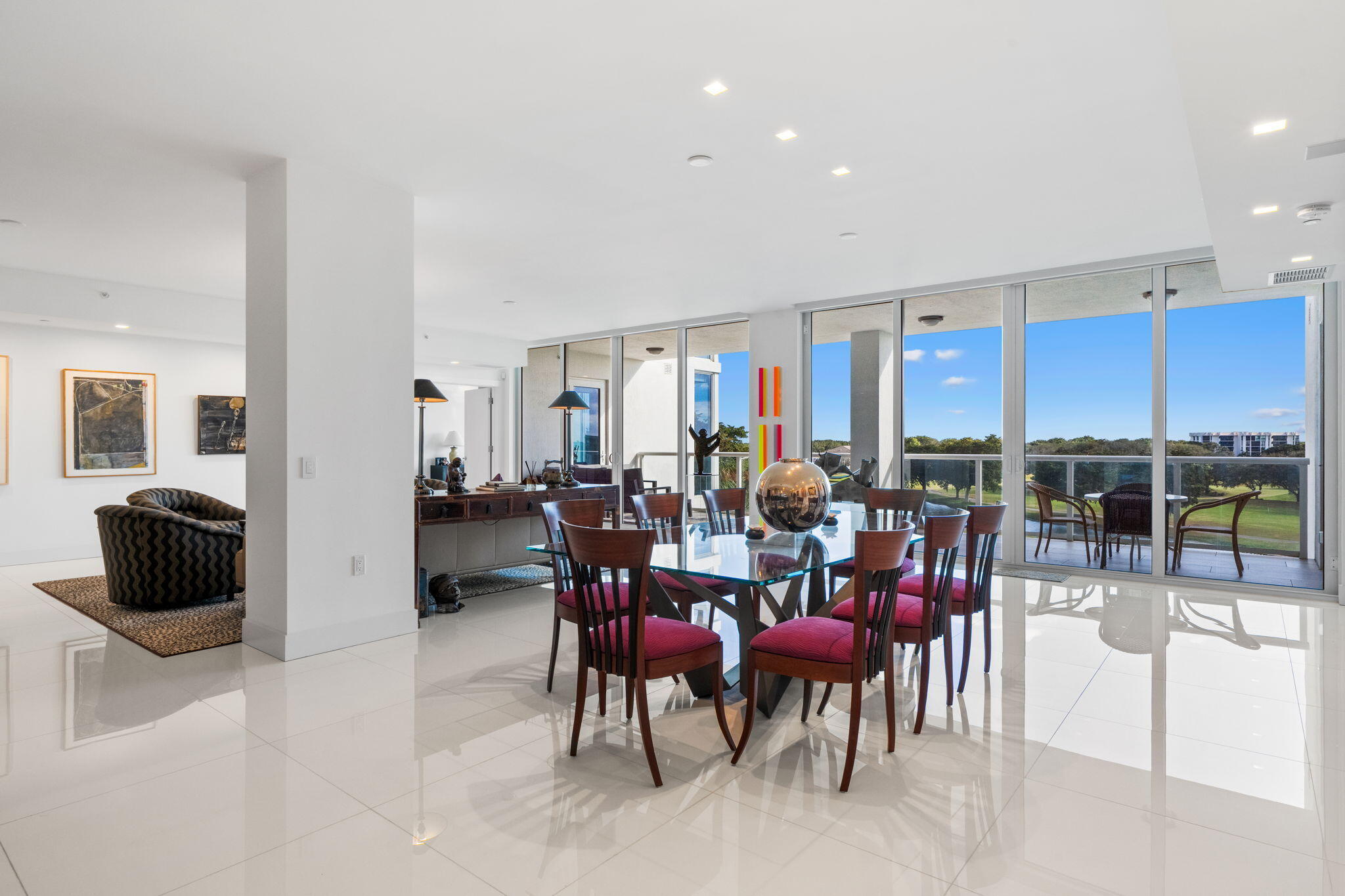 20155 Boca W Drive, Unit A404 Boca Raton, FL 33434 - Photo 8 of 52 a view of a dining room with furniture