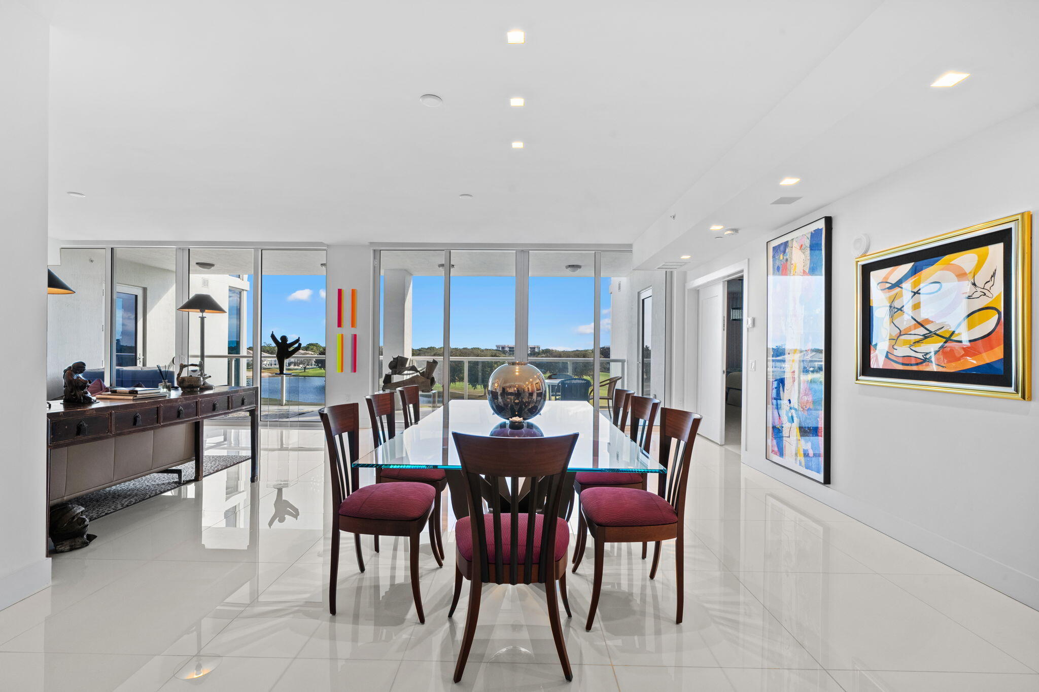 20155 Boca W Drive, Unit A404 Boca Raton, FL 33434 - Photo 9 of 52 a view of a dining room with furniture