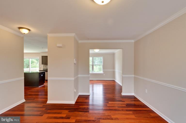 5919 Plata Street Clinton, MD 20735 - Photo 11 of 25 wooden floor in an empty room