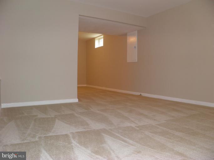 5919 Plata Street Clinton, MD 20735 - Photo 14 of 25 a view of an empty room with a window