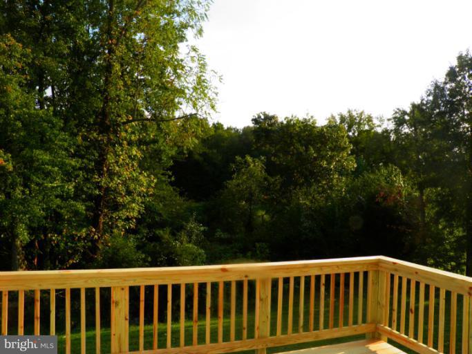 5919 Plata Street Clinton, MD 20735 - Photo 15 of 25 a view of balcony with yard